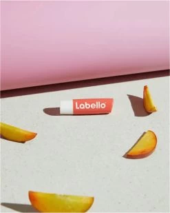 Labello Fruity Shine Peach Lippenbalsem - 5.5ml -Mode-Cosmetica Winkel 959x1200 1